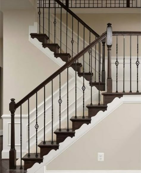 Wood Staircase With Iron Spindles, Cast Iron Staircase Spindles, Iron Spindle Staircase Wood Railing, Black Iron Spindles Staircase, Iron Balusters Stairs Modern, Iron Rod Staircase, Black Wrought Iron Staircase, Iron Spindles On Stairs, Staircase Iron Spindles