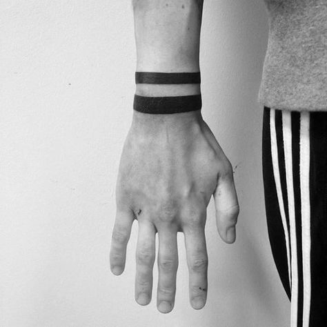 Top 43 Black Band Tattoo Ideas [2021 Inspiration Guide] Black Band Tattoo, Wrist Band Tattoo, Tattoos About Growth, Band Tattoos For Men, Tattoos Cross, Small Wave Tattoo, Tatuagem Masculina Pequena, Tattoos Cool, Tattoos Butterfly