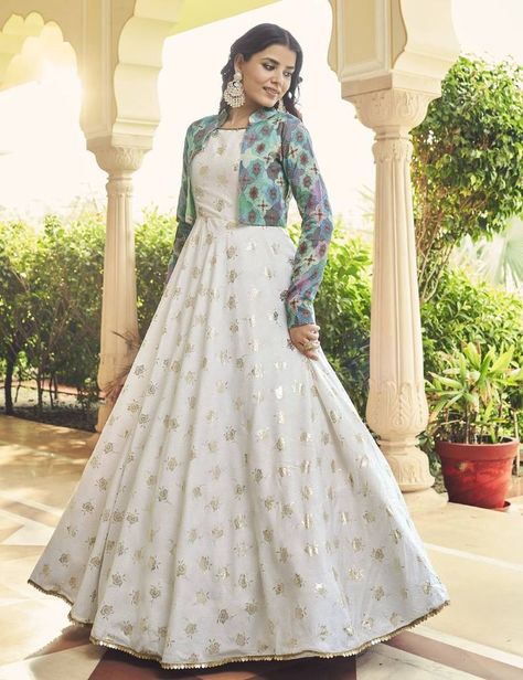 This gorgeous garment has some amazing embroidery made with sequins, thread, and resham embroidery. 1 Semi Stitched Anarkali Long Gown/1 Jacket. Eid Salwar Kameez, Trendy Gowns, Full Sleeve Gowns, Long Anarkali Gown, Engagement Gown, Sequins Gown, Fancy Gown, Gown With Jacket, Long Skirt And Top