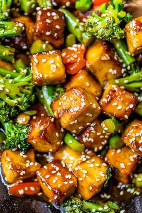 This quick and easy Sesame Soy Tofu Stir Fry is loaded with fresh and colorful vegetables and plant-based protein. #tofu #tofustirfry #plantbased #healthyrecipes #stirfry Firm Tofu Recipes, Stir Fry With Vegetables, Tofu Recipes Healthy, Soy Tofu, Tofu Stir Fry, Tofu Dishes, Sesame Sauce, Veggie Meals, Colorful Vegetables