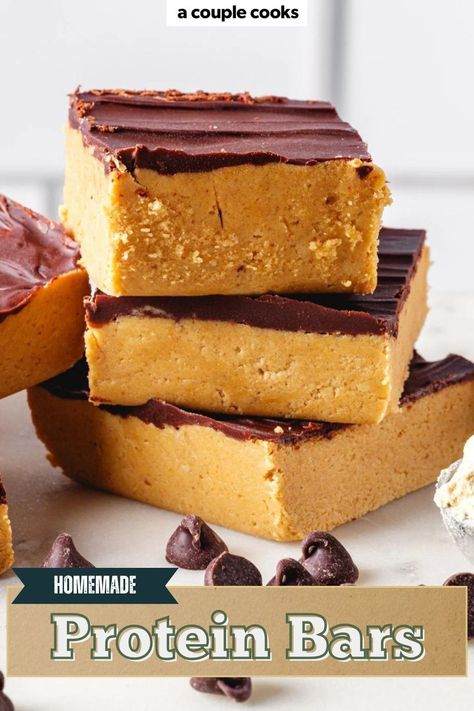 These Homemade Protein Bars are packed with peanut butter and chocolate flavor! They’re easy to make and perfect for a healthy, plant-based snack. Find the recipe on our site. Protein Puck Recipe, Low Sugar Protein Bar, Protein Peanut Butter Bars, Diy Perfect Bar Recipe, Healthy Bars Recipes Protein, Whole Foods Peanut Butter Bars, Homemade Power Bars, Diy High Protein Bars, Homemade Protein Bar