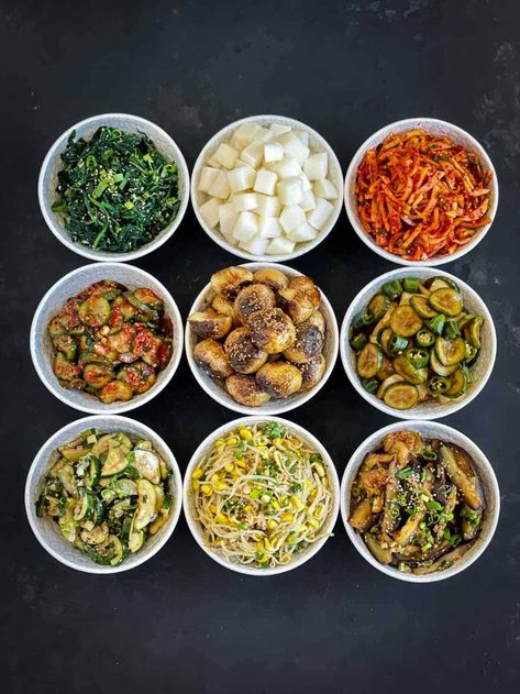 Traditional and authentic Korean side dishes (banchan) are delicious vegetable small plates served with main meals. With a few staple ingredients, fresh vegetables and these easy-to-follow recipes, you’ll be making Korean banchan in no time! Korean Side Dish Recipes, Banchan Recipe, Eggplant Side Dishes, Korean Banchan, Chinese Side Dishes, Korean Food Side Dishes, Korean Vegetables, Spinach Side Dish, Zucchini Side Dishes