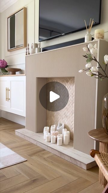 Kerry Kellett on Instagram: "I finally got round to creating that dream fluted fireplace  I had planned over a year ago 🤍✨  Panels from @panelsbysofia  Tiles from @bandq_uk  Paint is a mix of white 03 and beige 02 @lick   #fireplace #fireplaces #fireplace🔥 #fireplacedecor #fireplacemakeover #fireplacedesign #fireplacemantel #flutedfireplace #homediy #homediyproject #diyprojects #homeinterior #modernhomedesign" Flute Fireplace, Fluted Panel Tv Wall With Fireplace, Diy Fluted Fireplace Surround, Diy Fluted Fireplace, Fluted Stone Fireplace, Fireplace Mantle Design, New Fireplace Ideas, Closed Fireplace Ideas, Fluted Wood Fireplace