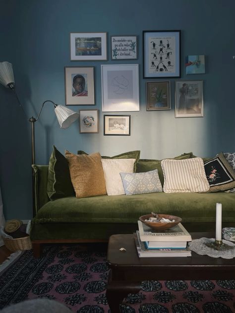 Green Sofa Blue Walls Living Room, Blue Wall Green Couch, Green Sofa Blue Walls, Green Couch Wall Color, Green Couch Blue Walls, Blue Wall Living Room, Front Sitting Room, Green Couch Living Room, Plants And Books