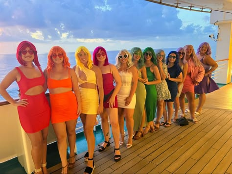 We had all the girls wear colorful dresses and matching sunglasses! Neon Wigs Bachelorette, Wig Bachelorette Party Outfits, Bachelorette Wig Night, Wig Night Bachelorette Outfit, Vacation Theme Nights, Bachelorette Wigs, Wig Bachelorette Party Ideas, Wig Party Outfit, Bachelorette Outfit Ideas Group