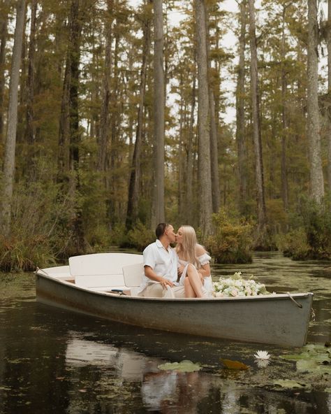 These need a permanent spot on my feed 😍 This will forever be one of my favorite locations for engagement photos!!! So dreamy & romantic But also who wouldn’t want photos where the boat scene in The Notebook was filmed??? #cypressgardens #engagementphotos #engaged #thenotebook #weddingphotographer #scweddingphotographer #charlestonsc #charlestonphotographer Notebook Engagement Pictures, The Notebook Inspired Photoshoot, The Notebook Engagement Photos, Boat Engagement Photos, Surprise Proposal Pictures, Boat Engagement, Boat Photoshoot, Cypress Gardens, Proposal Pictures