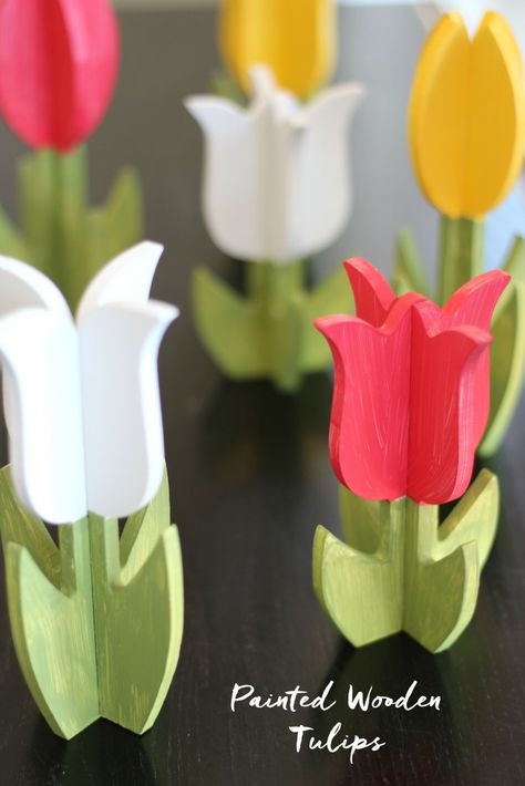 DIY painted wooden tulips. Super cute springtime decor! Wooden Spring Decor, Tulip Decorations, Lightstick Ideas Fanmade, Diy Tulips, Wooden Tulips, Springtime Decor, Lightstick Ideas, Wooden Crafts Diy, Tulip Decor