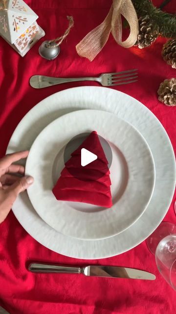 Manuela Mazzocco on Instagram: "✨Christmas Tree Napkin Fold✨ One more way to showcase the magic of the season❤️ This simple yet enchanting fold can add a sprinkle of joy to your holiday celebrations😘 Merry Christmas 🎄  #napkinfold #tutorial #howto #napkin #tabledecor #holidaytable" Fold Napkins Christmas Tree, How To Fold Napkins Like A Christmas Tree, Napkin Folded Like Christmas Tree, Christmas Tree Napkin Fold Tutorials How To Make, Xmas Tree Napkin Fold, How To Fold A Paper Napkin Like A Christmas Tree, Folding A Napkin Like A Christmas Tree, How To Fold The Napkin, How To Put Napkins On Table