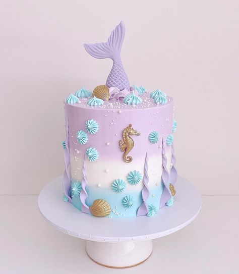 Mermaid-inspired tall birthday cake Tall Birthday Cake, Birthday Themes For Girls, Ocean Birthday Cakes, 8th Birthday Cake, 5th Birthday Cake, Mermaid Theme Birthday Party, Mermaid Birthday Cakes, Creative Party Ideas, 4th Birthday Cakes