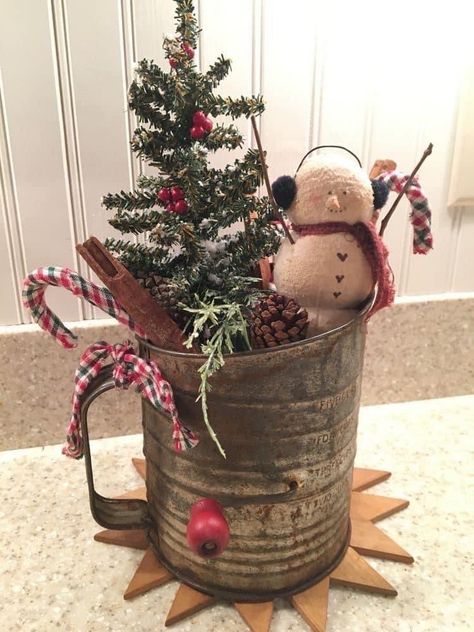 Christmas Grater Decor, Vintage Flour Sifter Christmas, Crafts Using Coffee Cans, Chicken Feeder Christmas Decor, Vintage Sifter Decor, Vintage Tool Box Decor Ideas, Vintage Flour Sifters Decor, Trio Of Christmas Trees, Antique Christmas Decorations Rustic