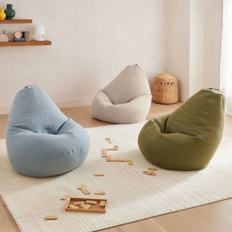 KEY DETAILS  40"w x 25"d x 51"h.  Sand, Olivine and Blue Bird: Cotton and jute cover.  Ivory: 100% shearling cover.  Pre-filled; cover isn't removable.  Made in India. Soft Bean Bag Chair, Bean Bag Nook, Kids Lounge Room Ideas, Been Bag, Modern Bean Bag Chairs, Peekaboo Kids, Kids Lounge Chair, Modern Bean Bags, Kids Bean Bag Chairs