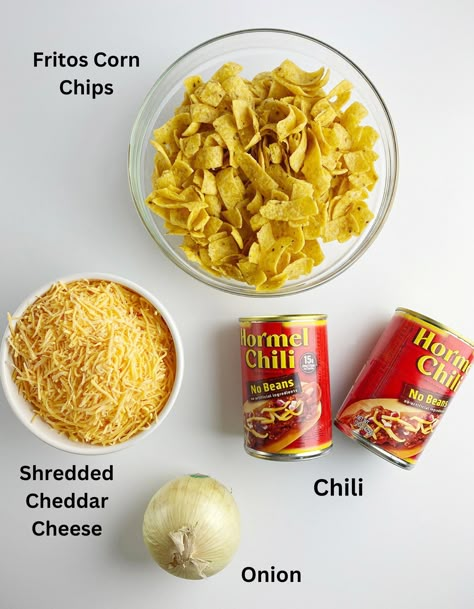 Sometimes you just need a little Frito Chili Pie and that's all there is to it. Here's your easy recipe! And I do mean EASY. #fritos #chili #supper #fritochilipie #framedcooks #kidfriendly Frito Pie With Wolf Brand Chili, Fritos And Chili, Meals With Fritos, Easy Frito Chili Pie, Frito Pie With Canned Chili, Frito Meals, Chilli Frito Pie Recipe, Chili Frito Pie Recipe Easy, Frito Chili Pie Recipe Easy