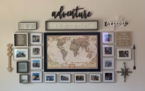 I love how my travel wall turned out. I wanted to create memories from all of my travels with family and friends. My push pin map is at the center with locations we have been. Travel Art Gallery Wall, Travel Picture Wall Ideas Photo Displays, Adventure Gallery Wall, Travel Wall Decor Ideas, Travel Gallery Wall Ideas, Travel Souvenirs Display, Travel Photo Wall Ideas, Travel Picture Wall, Family Travel Map