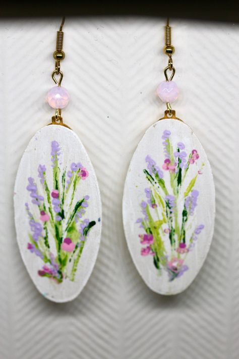 My original handpainted oval wood earrings with bead trim by RoxanneBlackBeadwork on Etsy Hand Painted Earrings Handmade, Hand Painted Purple Earrings As Gift, Everyday Hand Painted Pink Earrings, Unique Hand Painted Purple Earrings, Colorful Hand-painted Dangle Jewelry, Hand Painted Earrings Wood, Wooden Handpainted Earrings, Nature-inspired Hand Painted Drop Earrings, Artsy Earrings