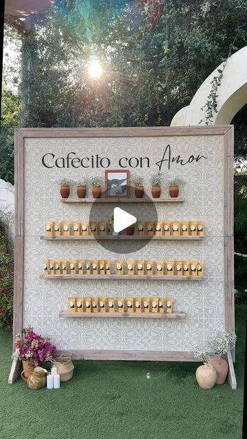 Elisa Marie ✿ on Instagram: "One of my favorite parts of our wedding ~ the cafecito wall ☕️✨ Carlos & I LOVE getting coffee together every weekend and trying out new spots so this was the perfect wedding favor 🫶🏻 The wall is from @alwaysparticular who did an amazing job! We used @philzcoffee Philtered Soul coffee beans and ordered custom stickers off @canva for the bags! 

This was inspired by @kristinatrejoo whose wedding I loved 🤍

#wedding #weddingday #weddinginspiration #weddingideas #socalwedding #weddingfavors #weddingcontentcreator #weddingreels #reelsinstagram #reelitfeelit #reelsviral #trendingreels #tivoliweddings #coffee #coffeetime #weddinginspo #weddingdetails" Party Favor Display, Coffee Themed Wedding, Coffee Reception, Favor Display, Coffee Bar Wedding, Lavender Wedding Theme, Coffee Together, Coffee Wedding, Coffee Theme