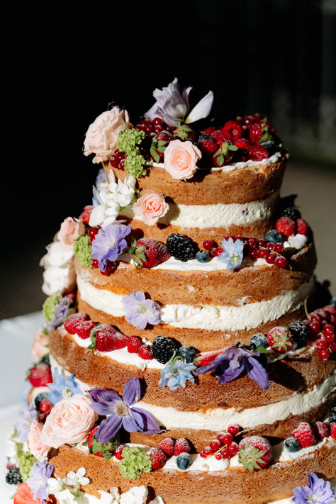 Treat your guests to a slice of elegance with our Naked Berry Wedding Cake! Layers of moist cake adorned with fresh berries and a hint of rustic charm, this cake is a delightful addition to your wedding celebration. Explore more delicious ideas on our website and follow us for wedding inspiration! 💍🍰 #NakedCake #BerryCake #WeddingDessert #RusticChic Wedding Cake Fruit And Flowers, Indie Wedding Cake, Berries Wedding Cake, Rustic Floral Wedding Cake, Fruit Tart Wedding Cake, Wedding Cake Non Traditional, Strawberry Themed Wedding, Whimsical Wedding Food, Wedding Cake Naked Rustic