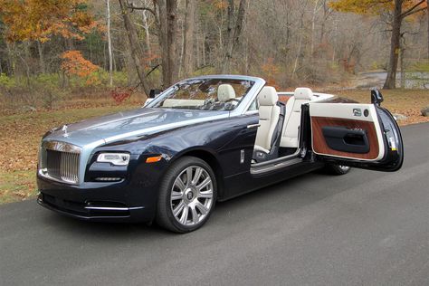 The 2016 Rolls-Royce Dawn convertible is both massive and massively luxurious. It’s the kind of car only Rolls could make. Rolls Royce Dawn, Rolls Royce Motor Cars, Bmw Classic Cars, New Sports Cars, Pagani Huayra, Best Classic Cars, British Cars, Sports Cars Luxury, Camping Car