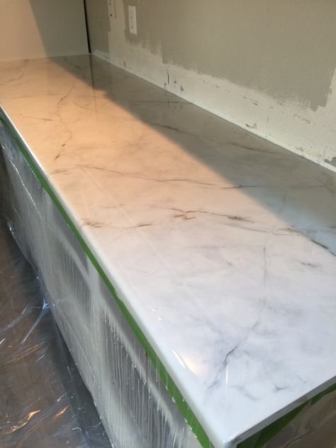 White Marble Epoxy Countertops!!! Easy, affordable, customizable, durable, food-safe, and can be applied over existing surfaces. 47K Solutions. (425) 243-3397 or 47ksolutions@gmail.com #epoxy #epoxycountertops #countertops #whitemarblecountertops #countertopideas #remodel #kitchencountertopideas White Epoxy Countertop, Marble Epoxy Countertop, Alternative Countertops, Giani Countertops, Giani Countertop Paint, Formica Kitchen, Countertop Paint Kit, Countertop Epoxy, Countertop Paint