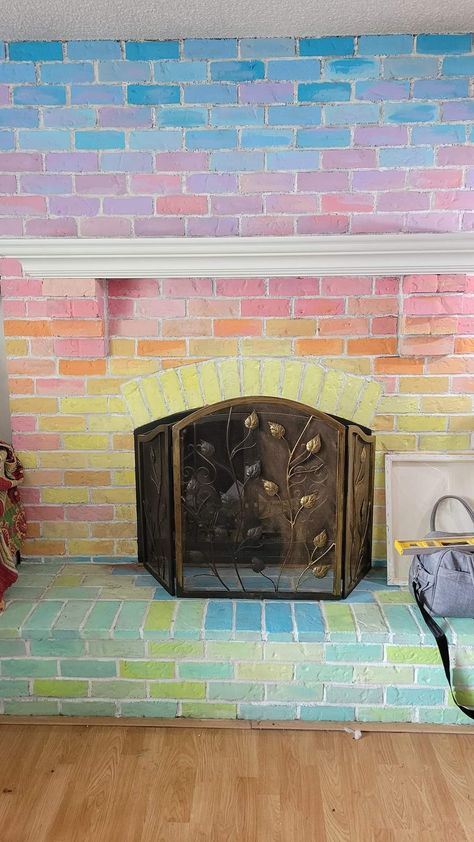 Colorful Brick Fireplace, Colorful Painted Brick Fireplace, Rainbow House Exterior, Whimsical Fireplace, Colorful Fireplace Painted, Colorful Mantle, Decorating Inside Fireplace Ideas, Colorful Fireplace, Funky Wall Paint Ideas