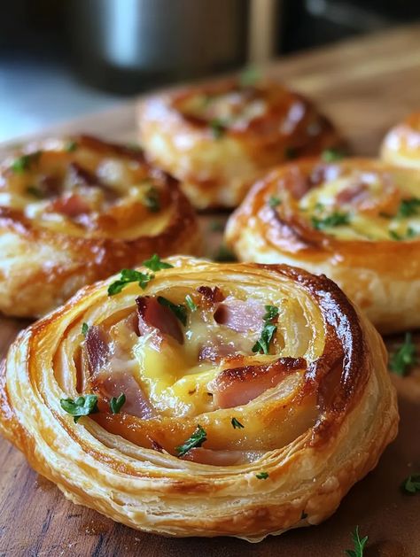 Savory Ham and Cheese Puff Pastry Pinwheels – A Delightful Snack for Any Occasion Puff Pastry Cheddar Cheese, Appetizer Recipes Picnic, Puff Pastry Appetizers Pinwheels, Breakfast Savory Pastry, Ham Cheese Pinwheels Puff Pastries, Ham And Swiss Appetizers, Savory Ham And Cheese Puff Pastry Swirls, Han And Cheese Puff Pastry Pinwheels, Savory Baked Goods For Bake Sale