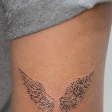 Half Wing Half Flower Tattoo, Half Angel Wings Half Flowers Tattoo, Angel Wing Tattoo On Ribs, Angel Wings Tattoo Thigh, Tattoo Ideas Female Wings, Angel Wings Flowers Tattoo, Feminine Wing Tattoo, Half Angel Half Butterfly Tattoo, Angel Wing Flower Tattoo