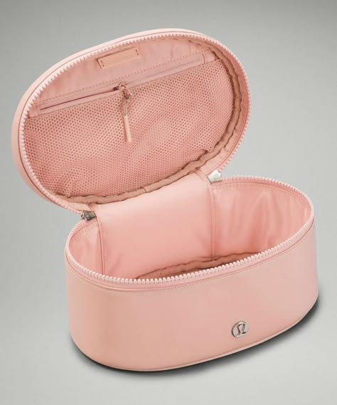 Original Price: $48. Color: Precocious Pink. One kit to stash it all. With a structured design and a top handle for easy carrying, this multi-purpose bag makes storing toiletries, make-up, or accessories stress-free.Water-repellent FabricFabric is water-repellent fabric.Water-repellentFeaturesDesigned for: On the MoveVolume: 3.5L Lululemon Stuff, Girly Christmas Gifts, Preppy Bags, Preppy Gifts, Lululemon Bags, Multipurpose Bag, Cute School Supplies, Bags Aesthetic, Essential Bag