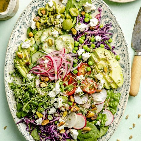 Beautiful spring green salad filled with fresh seasonal produce, seeds & creamy avocado, and tossed in the BEST lemon basil vinaigrette. Enjoy this gorgeous, flavorful spring salad as a main meal, easy side dish, or recipe for a potluck! Summer Potluck Salads, Spring Green Salad, Spring Fruit Salad, April Recipes, Chicken And Salad, Lemon Basil Vinaigrette, Fruit Salad Ingredients, Types Of Salads, Spring Salads