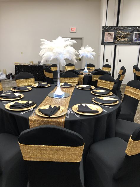 Black And Gold Center Piece Birthday, Black Gold White Table Setting, Black And Gold Party Decorations Table, Great Gaspy Prom, Black And Gold 50th Birthday Ideas, Black And Gold Themed Birthday Party, Black And Gold Table Centerpieces, Black And Gold Table Decorations, Black And Gold Party Theme