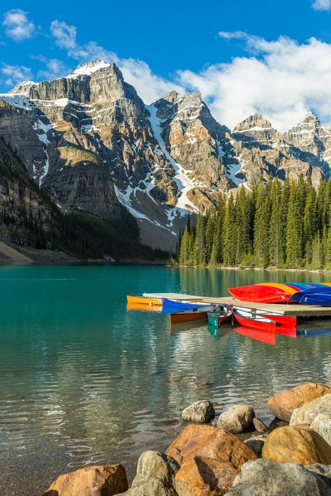 “Its waters are the most amazing colour, a vivid shade of turquoise that changes in intensity through the summer as the glaciers melt. Set in the rugged Valley of the Ten Peaks, Moraine Lake is surrounded by mountains, waterfalls, and rock piles, creating a scene so stunning it almost seems unreal. It’s an iconically jaw-dropping place that is sure to leave a lasting impression.” - Banff & Lake Louise Tourism 📸: Andy Holmes #travel #traveldestination #aesthetic #Traveltips Lake Louise Canada, Travel Itinerary Planner, Camping Photography, Dream Dream, Moraine Lake, Puzzle For Adults, Lake Sunset, Nature Water, Mountain River