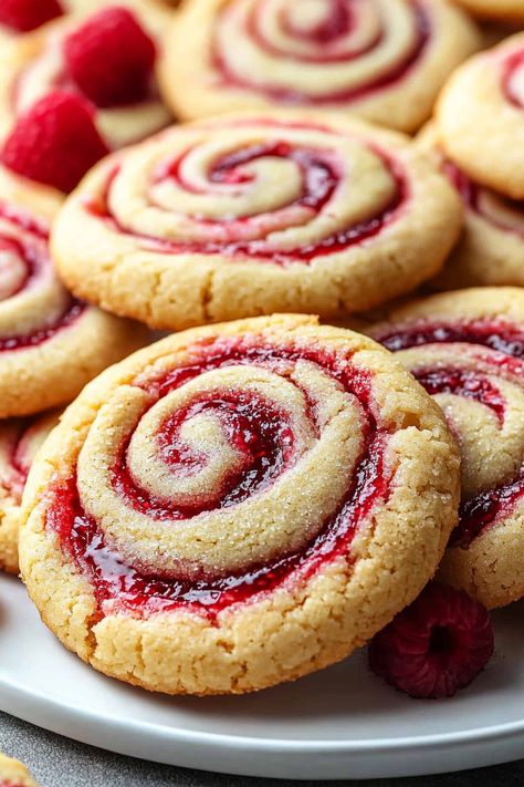 Rasberry Cookies Christmas, Raspberry Ribbon Cookies, Fun Cookie Flavors, Raspberry Swirl Cookies, Raspberry Swirl Shortbread Cookies, Raspberry Cookies Recipes, Grape Cookies, Rosettes Cookie Recipe, Cream Cheese Dough