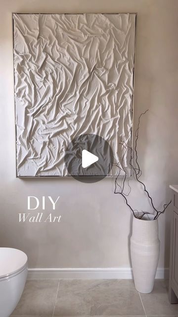 Ashley Gray on Instagram: "DIY wall art ✨🤍   I wanted something oversized and had the perfect capped frame wall art that I no longer needed so this made the perfect base for my diy!   I used an old bed sheet and some PVA glue mixed with water to create the texture and design 🤩   I then used some leftover paint to add colour and I’m so pleased with how it has turned out!   It is the perfect addition to my downstairs bathroom and I can’t wait to share the rest of this mini renovation soon 🤍✨  Hope you all have a lovely Sunday, I have the roast cooking away and looking forward to a chilled evening   A x   #diywallart #wallart #doityourself #dıyproject #craftproject #diyhack #diydecor #diyideas #neutraldecor #limewashpaint #limewash #homehacks #neutralhomedecor #texturedart #texturesandtone Framed Fabric Wall Art, Diy Dream Home, Old Bed Sheets, Ashley Gray, Dollar Store Diy Organization, Pva Glue, Bathtub Decor, Rustic Bathroom Designs, Leftover Paint