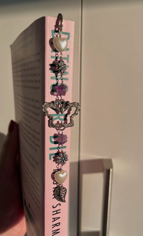 Amethyst metal hook bookmark! One of a kind crystal bookmark for book lovers🫰🏼available on depop : mini_styles Crystal Bookmark, Amethyst Butterfly, Butterfly Bookmark, Handmade Bookmarks Diy, Penanda Buku, Charm Bookmark, Origami For Beginners, Bookmark Craft, Beaded Bookmarks