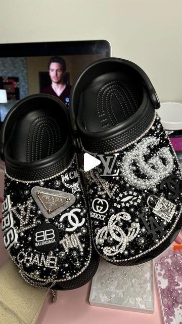 Blinged By Liy 🫶🏽 on Instagram: "Custom black designer bling crocs 💋🖤    - FOLLOW @blingedbyliy FOR MORE 💕   Want to learn how to customize shoes like me? Click the link in my bio to watch my how to videos and join my group chat 🫶🏽  - The quickest and easiest way to get a response is by following the messaging prompt located on my page! 💕  ✨PLEASE BE PATIENT AND RESPECTFUL ✨  #customcrocs #blingedoutcrocs #blingedout #blingcrocs #customs #custommade #customcrocs #blingshoes #blingbling #crocs #designercrocs #theyenvyliy #crocswomen #customshoes #blingedbyliy #757artist #757art #crocgirlsummer #crocgirl #crocs #customeverything #blingbling #blackowned #blackgirlmagic #smallbusinessowner #largebusinessowners" Chanel Crocs Shoes, Blinged Out Black Crocs, How To Bling Crocs Diy, Black Custom Crocs, Croc Ideas Black, Black Bling Crocs, Crocs Rhinestone, Crocs Diy Ideas, Diy Crocs Shoes