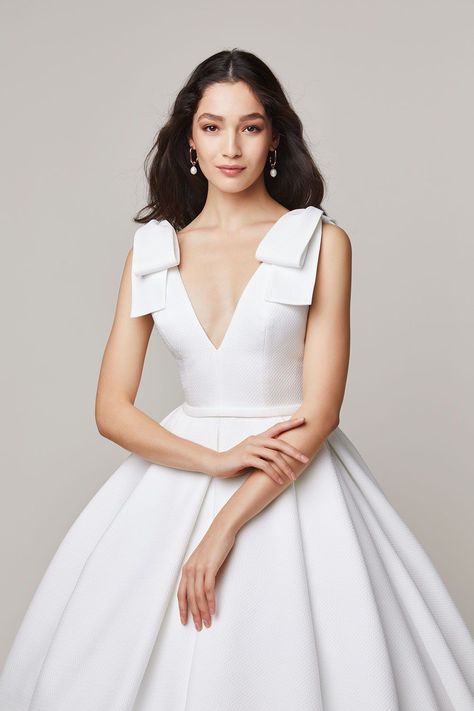 The Jesus Peiro 2022 bridal collection preview at Miss Bush. Available now at our chapel bridal boutique in Ripley, Surrey, 20 minutes from London. #jesuspeiro #textures #2022 #bridal #ukstockist #weddingdress #boutique #bride #weddingdress #fashion #modern #stylish #bow #pockets #fullskirt #pleats Wedding Dresses Bow, Dress With Bow On Shoulder, Wedding Dresses With Bows, Dresses With Bows, Wedding Dresses With Pockets, Voluminous Dress, Dresses Bow, 2018 Outfits, Jesus Peiro