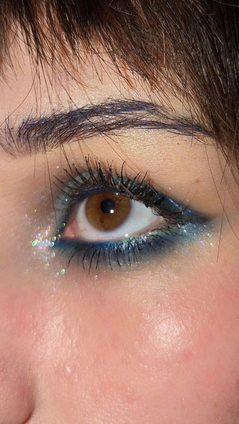 "Oh Christmas brow, oh Christmas brow, how lovely are your arches... Makeup Eye Aesthetic, Shiny Blue Makeup, Blue Mascara On Brown Eyes, Blue Make Up Brown Eyes, Brown Eyes Glitter Makeup, Makeup Inspo Eyeshadow, Navy Eyeliner Brown Eyes, Eye Makeup Blue Eyeliner, Brown Eye Blue Eyeshadow