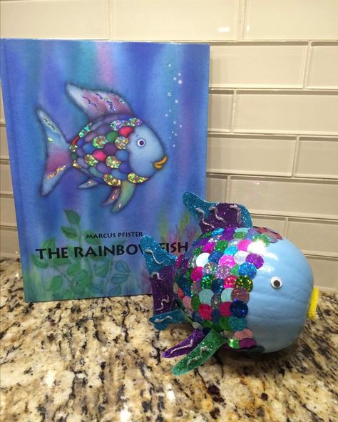 I love this Rainbow Fish themed pumpkin! Are you having your students decorate pumpkins this year?Credit:unknown Book Character Ornaments Diy, Bluey Pumpkin Painting, Rainbow Fish Pumpkin, Painted Pumpkin Contest, Pumpkin Book Report, Pumpkin Book Characters, Fish Pumpkin, Book Pumpkins, Storybook Pumpkin