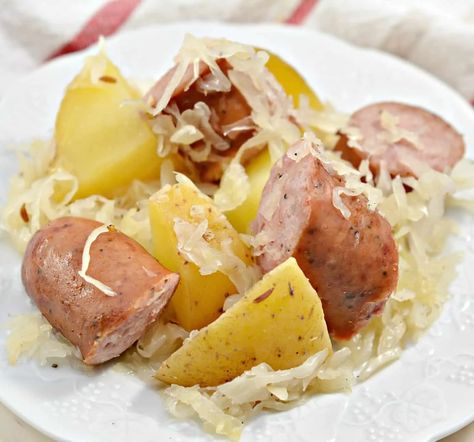 Polish Sausage, Sauerkraut And Potatoes (Crockpot) - Sweet Pea's Kitchen Polish Sausage And Sauerkraut, Polish Sausage Sauerkraut And Potatoes, Sauerkraut In A Crock, Sauerkraut And Potatoes, Kielbasa And Sauerkraut, Sausage And Sauerkraut, Polish Sausage Recipes, Potatoes Crockpot, Sausage Sauerkraut