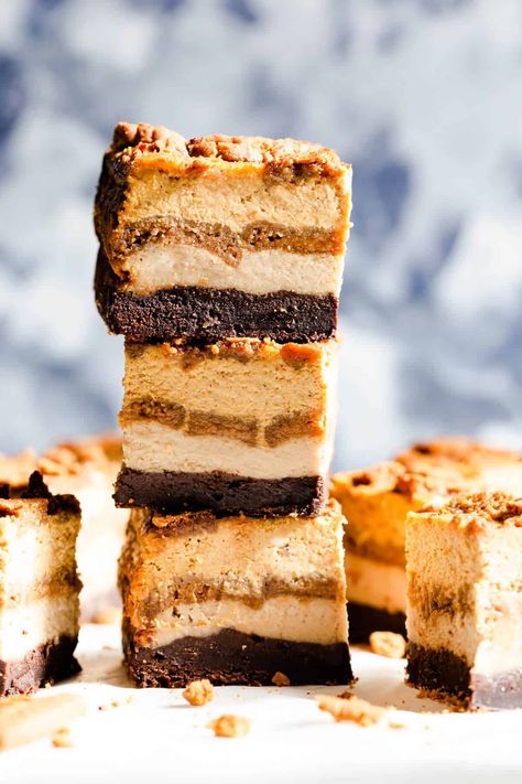 Discover these irresistible pumpkin biscoff cheesecake brownie bars from Anna Banana! The creamiest and most decadent treat for this autumn! Made with layers of rich brownie, biscoff cheesecake & biscuits and creamy pumpkin cheesecake layer #pumpkin #dessert Pumpkin Biscoff, Pumpkin Granola Bars, Cheesecake Brownie Bars, Biscoff Cake, Biscoff Recipes, Cheesecake Layer, Cheesecake Brownie, Biscoff Cheesecake, Pumpkin Cheesecake Bars