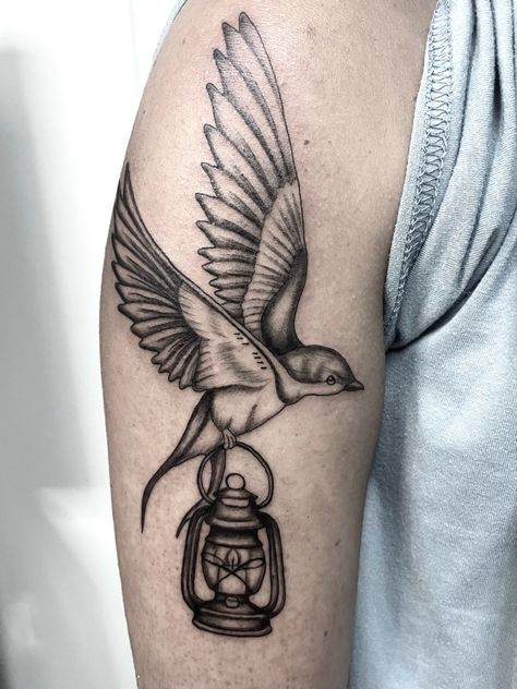 Tattoo of flying bird holding lantern Nightengale Bird Tattoo, Lantern Tattoos, Candle Lantern Tattoo, Nightingale Tattoo, England Tattoo, Nightingale Bird, Lamp Tattoo, Lantern Tattoo, Cute Simple Tattoos