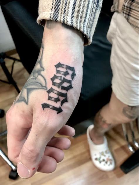 1989 gothic font tattoo (scar cover up)done by Jon Koon at Artistic studio hair and tattoo Singapore 1996 Old English Tattoo, Gangsta Font Tattoo, Gothic Writing Tattoo, 1989 Tattoo Ideas, First Love Tattoos, Gothic Font Tattoo, 1989 Tattoo, Old English Font Tattoo, Tattoo Scar Cover