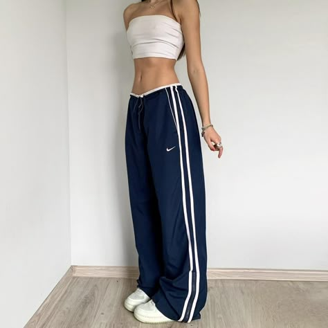 vinted adidas track pants on Depop 👍 https://depop.app.link/cuWn185vnyb Low Waisted Track Pants, Dark Blue Track Pants Outfit, Nike Navy Track Pants, Adidas Vintage Track Pants, Y2k Adidas Pants, Oversized Track Pants Outfit, Adidas Track Pants Outfit Y2k, Navy Adidas Pants Outfit, 90s Track Pants Outfit