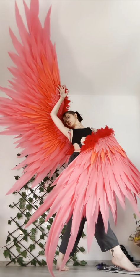 Red Feather Wing Reference Pose Winged Human Pose Reference, Art Reference With Wings, Angel Wing Poses, Flying Reference Pose Wings, Cosplay With Wings, Wing Pose Reference, Pose Reference Wings, Wing Poses Reference, Winged Poses