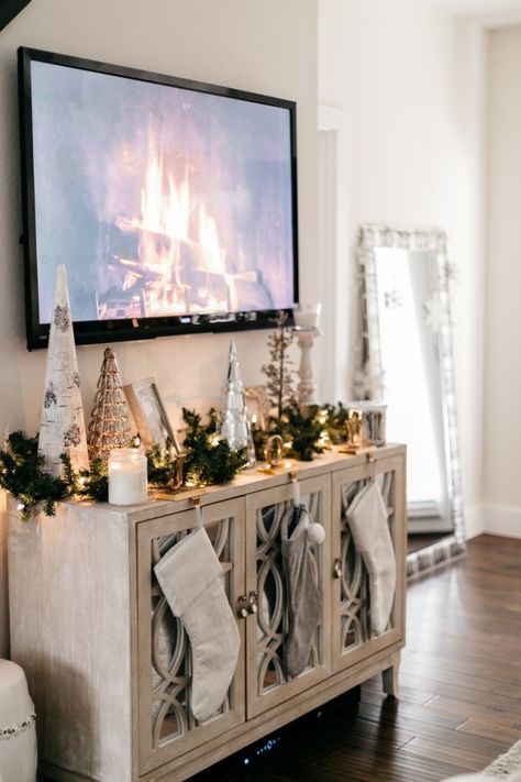 Christmas Holiday Home Decor | Home for the Holidays Tv Console Xmas Decor, How To Decorate Tv Stand, Christmas Decor Under Tv, Entertainment Center Christmas Decor, Christmas Entertainment Center Decor, Tv Console Christmas Decor, Decor Ideas For Tv Stand, Ideas For Tv Stand, Decorate Tv Stand