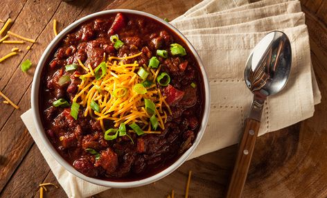 Cincinnati Chili | Rich with spices, including cinnamon, cloves, ginger, and nutmeg, this recipe from JBF America's Classics Award–winning Camp Washington Chili has a deep, beefy flavor and a nice kick. Chocolate Chili Recipe, Carne Adobada, Hearty Chili Recipe, Nutrisystem Recipes, Ground Beef Chili, Beef Chili Recipe, Chocolate Chili, Vegetarian Chili Recipe, Chili Recipe Turkey