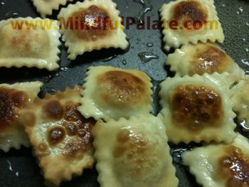 Sauteed Ravioli Recipe, Pan Fried Ravioli, Four Cheese Ravioli, Ravioli Recipe, Cheese Ravioli, Cheese Topping, Pan Seared, Party Foods, Pasta Sauce