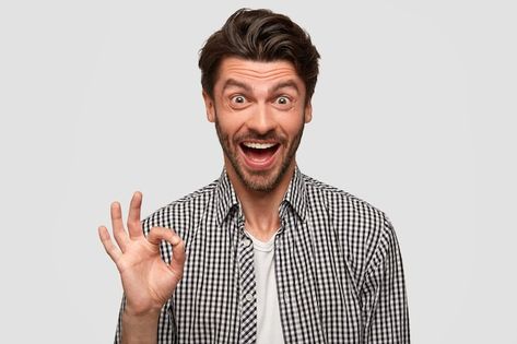 Glad happy man makes okay gesture, shows... | Free Photo #Freepik #freephoto #man-standing #person-standing #happy-man #people-man Thumbnail Poses, Smug Expression, 80s Background, Person Png, Thumbnails Youtube Background, Surprise Face, Thick Beard, Happy Man, Be Calm