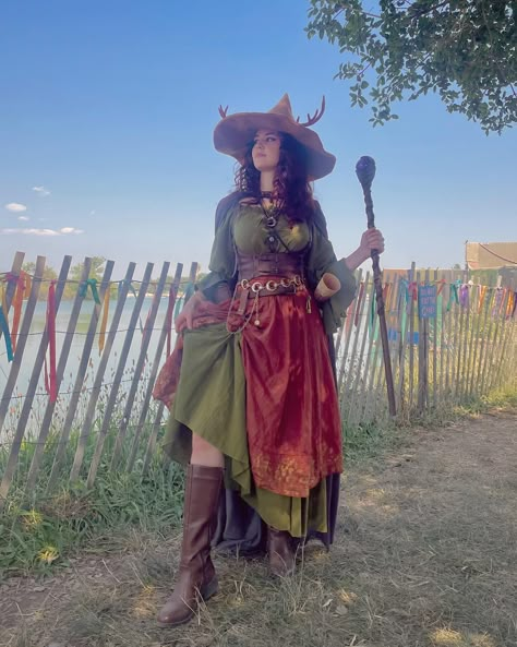 I love casting spells 🔮✨😌 📸 shoutout to @anmariluna for these magical pics!! 🧡 #witch #renfaire #magicstaff #renaissancefestival #witchhat #witchcosplay #fantasy #fantasycosplay #witchy #witchcraft #cosplay Colorful Ren Faire Outfit, Witchy Fantasy Outfits, Wizard Cosplay Female, Witch Renfaire Outfit, Female Wizard Costume, Ren Faire Costume Witch, Celestial Ren Faire Outfit, Wizard Costume Women, Witch Cosplay Ideas