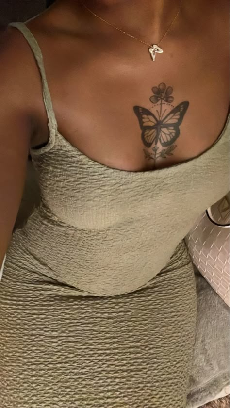 #tattooideas #butterflytattoo #tattoosforwomen #tattoo Girl Chest Tattoo Ideas For Women Black, Tattoos Black Women Dark Skin, Butterfly Tattoo Brown Skin, Dark Skin Girl Tattoos, Small Tattoos On Dark Skin, Butterfly Between Breast Tattoo, Chest Tattoo Black Women, Butterfly Tattoo Dark Skin, Chest Tattoo Black Woman