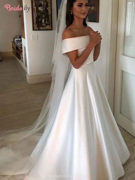 Amazing Off-the-Shoulder Covered Button Ruffles Wedding Dresses — Bridelily #bridelily#beautiful#weddingdresses Boho Wedding Dress Simple, Simple Satin Wedding Dress, Simple Bride, Short Sleeve Wedding Dress, Wedding Dress Simple, Off Shoulder Wedding Dress, Satin Wedding Gown, Dress Boho Wedding, Wedding Gowns With Sleeves