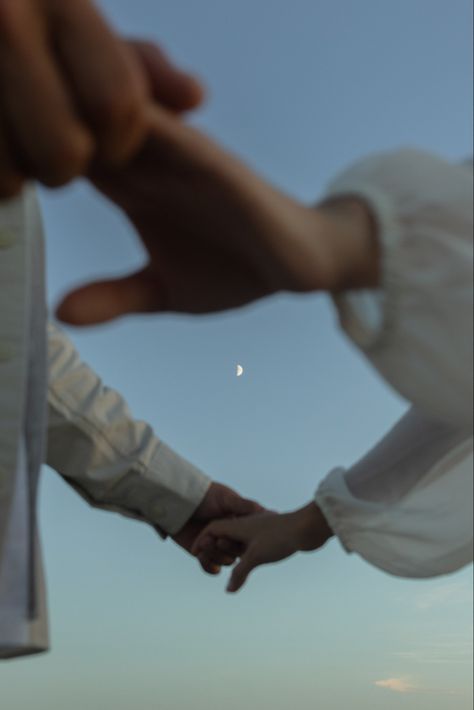 Couple holding hands during blue hour with the moonlight in between Blue Hour Couples Photos, Blue Hour Engagement Photos, Blue Couple Aesthetic, Walkoff Wedding, Hand Holding Photo, Couple Holding Hands Aesthetic, Holding Hands Photography, Moonlight Couple, Engaged Aesthetic